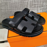 Hermès Grey Gladiator Sandals - Angled View