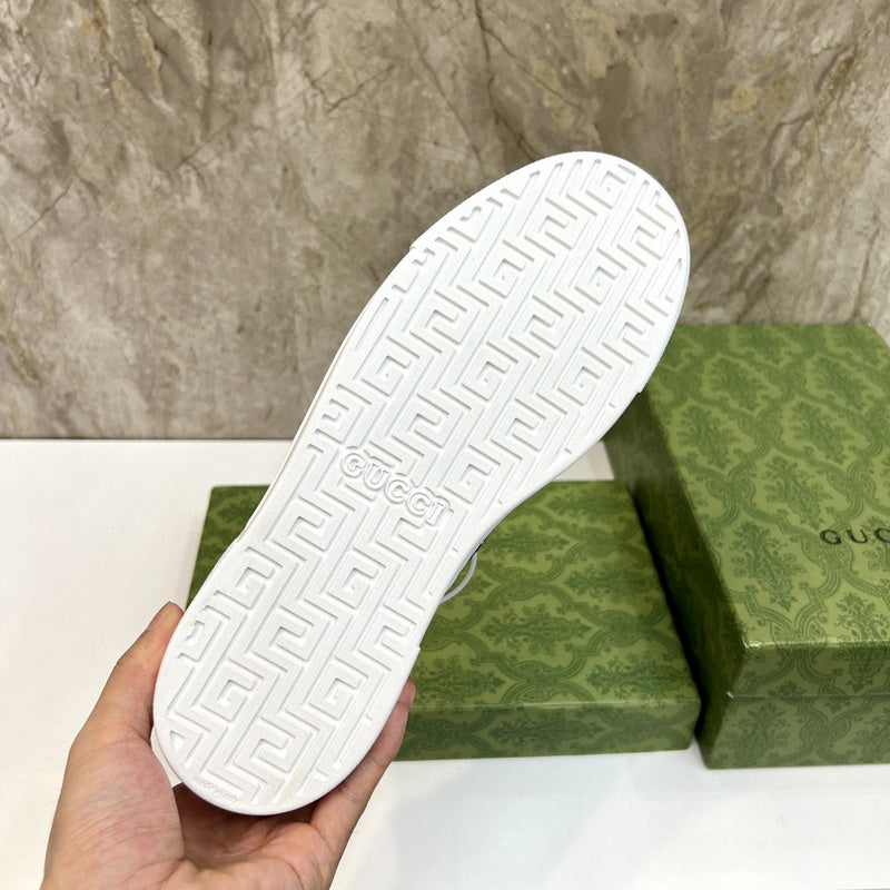 Side profile of Gucci neutral cream sneakers breathable knit upper