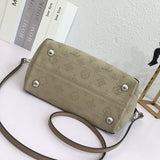 Styled lifestyle shot of premium everyday-luxe women's handbag – women's statement bag