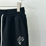 Flat lay presentation of Louis Vuitton luxury clothing with contemporary cut
