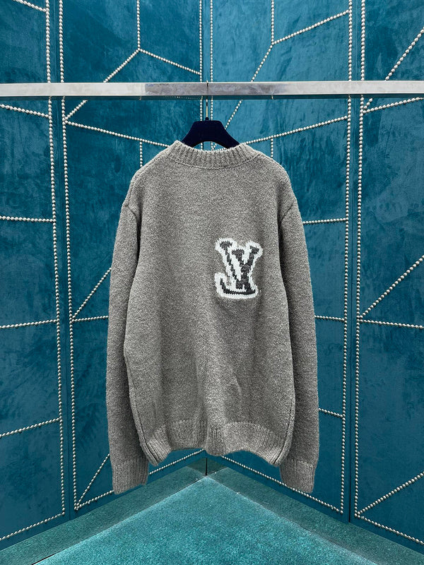 Side profile of Louis Vuitton luxury clothing with label-forward styling