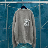 Side profile of Louis Vuitton luxury clothing with label-forward styling