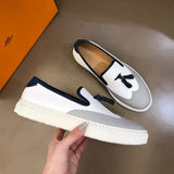 Hermès Red Low-Top Sneakers - Sole Detail View