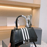 Ziva's Charm handbag – styled view (one versatile size)