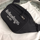 Back view of structured polished women's handbag – women's luxury handbag
