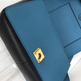 Back view of chic structured women's handbag – women's designer-style accessory