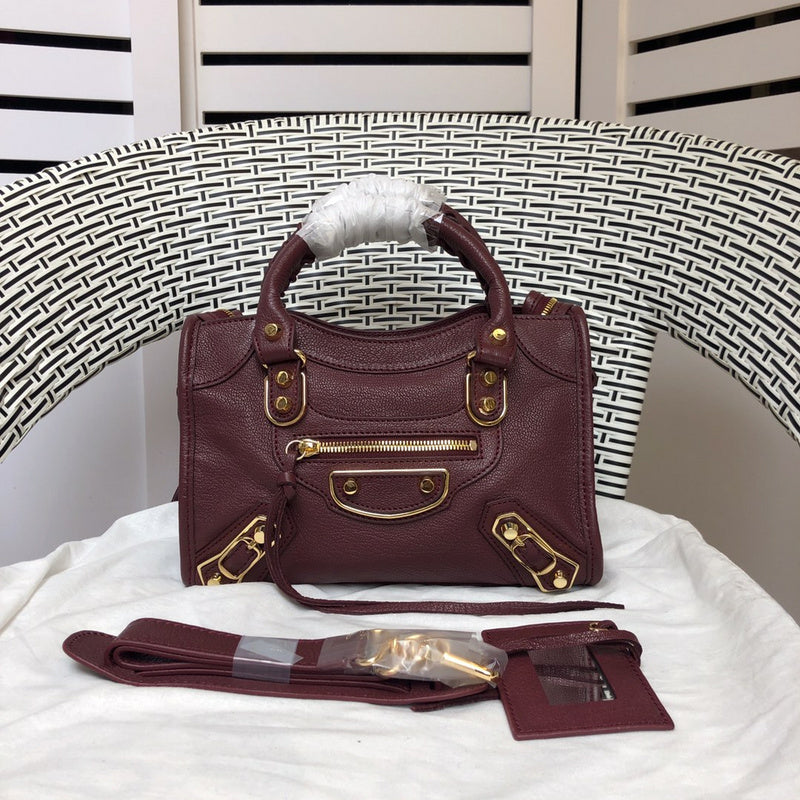 Styled lifestyle shot of everyday-luxe sleek women's handbag – women's statement bag