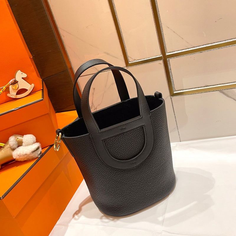 Side view of classic structured handbag
