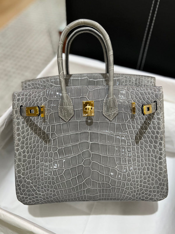 Side view of classic structured handbag