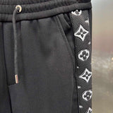 Flat lay presentation of Louis Vuitton luxury clothing with runway-inspired design