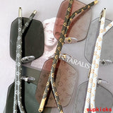 Close-up detail view of Louis Vuitton unisex sunglasses