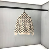 Side profile of Louis Vuitton luxury clothing with logo-detail design