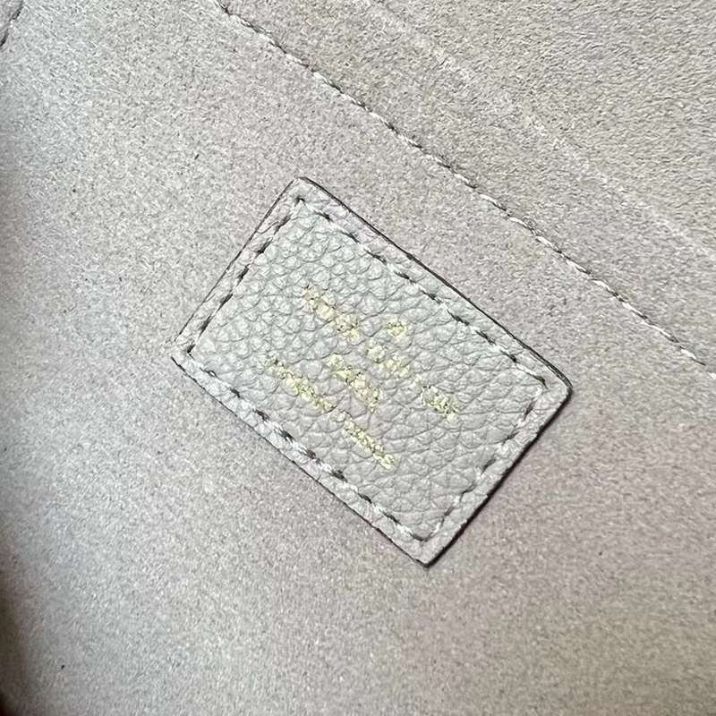 Front view of signature polished women's handbag – women's everyday handbag