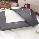 Side profile of modern refined women's handbag – women's luxury accessory