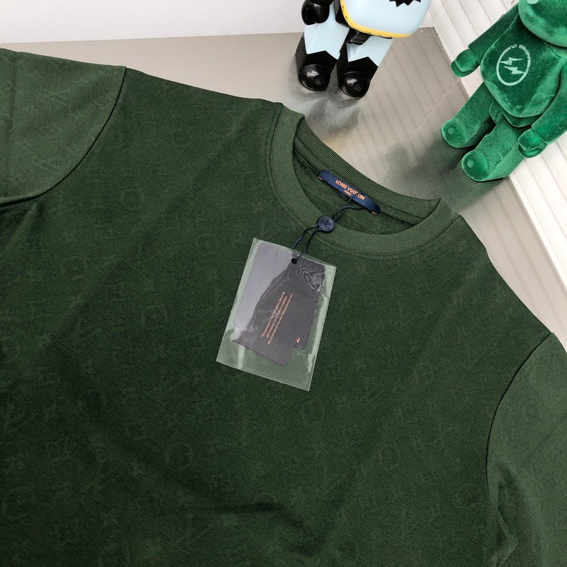 Close-up detail shot of Louis Vuitton cotton t-shirt with label-forward styling