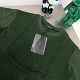 Close-up detail shot of Louis Vuitton cotton t-shirt with label-forward styling