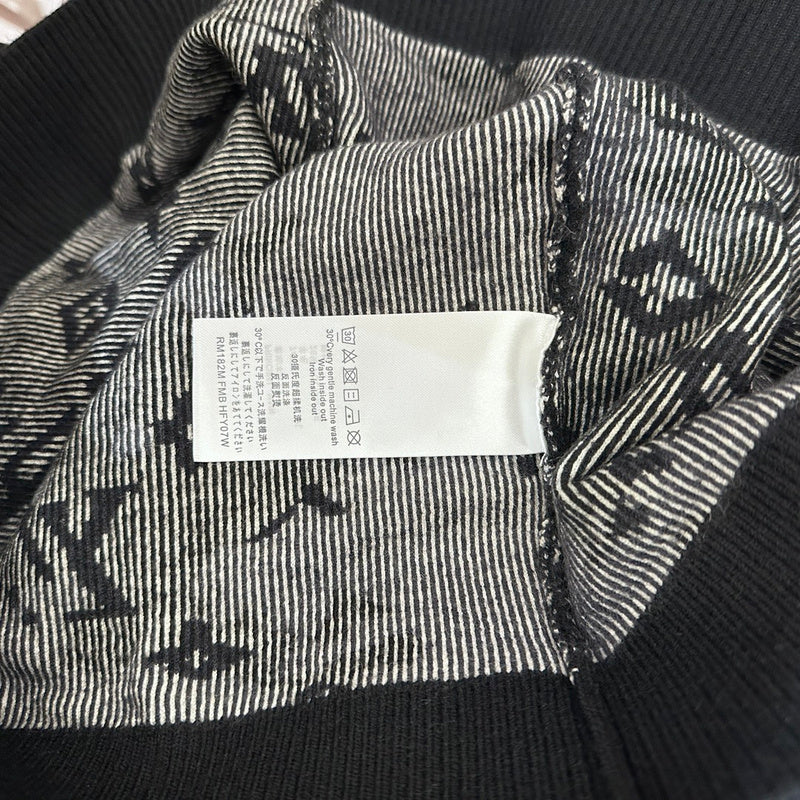 Front view of Louis Vuitton luxury clothing with everyday silhouette