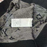 Front view of Louis Vuitton luxury clothing with everyday silhouette