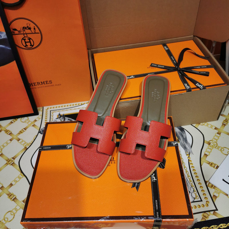 Hermès Red Slide Sandals - Lifestyle Styling Shot