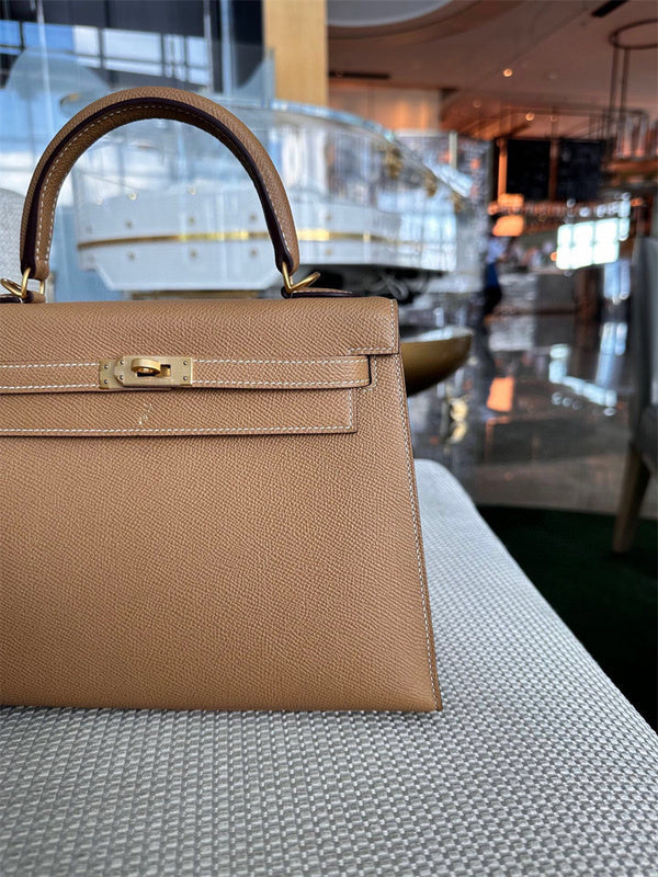  minimalist top-handle bag detail view showing craftsmanship