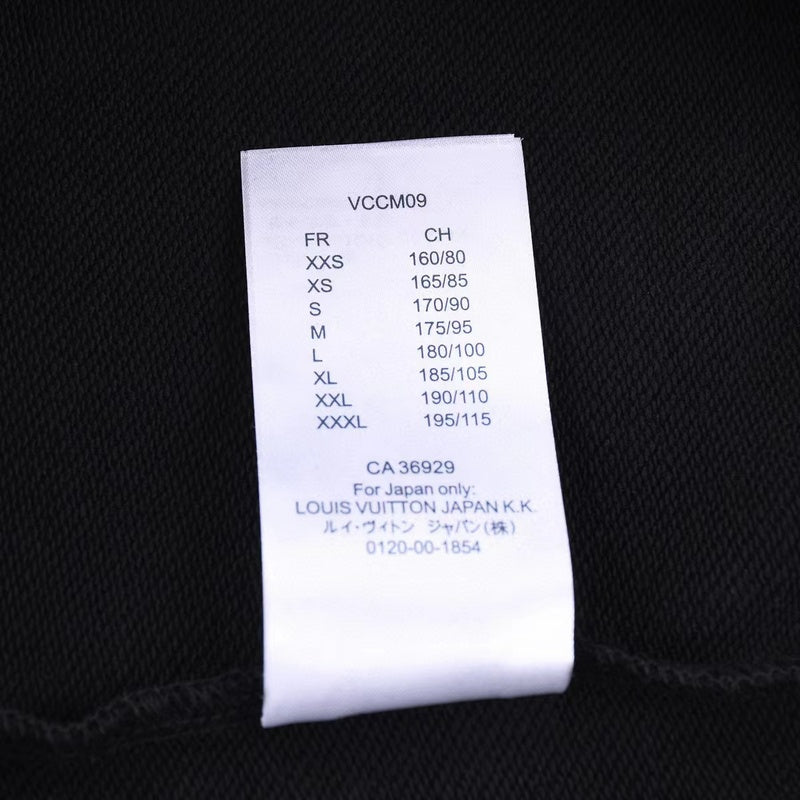 Side profile of Louis Vuitton luxury clothing with signature branding