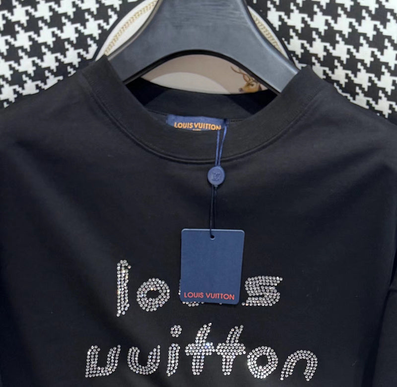 Flat lay presentation of Louis Vuitton cotton t-shirt with tailored silhouette
