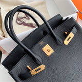 Side view of graceful structured handbag