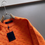 Full styled look of Louis Vuitton luxury clothing with logo-detail design