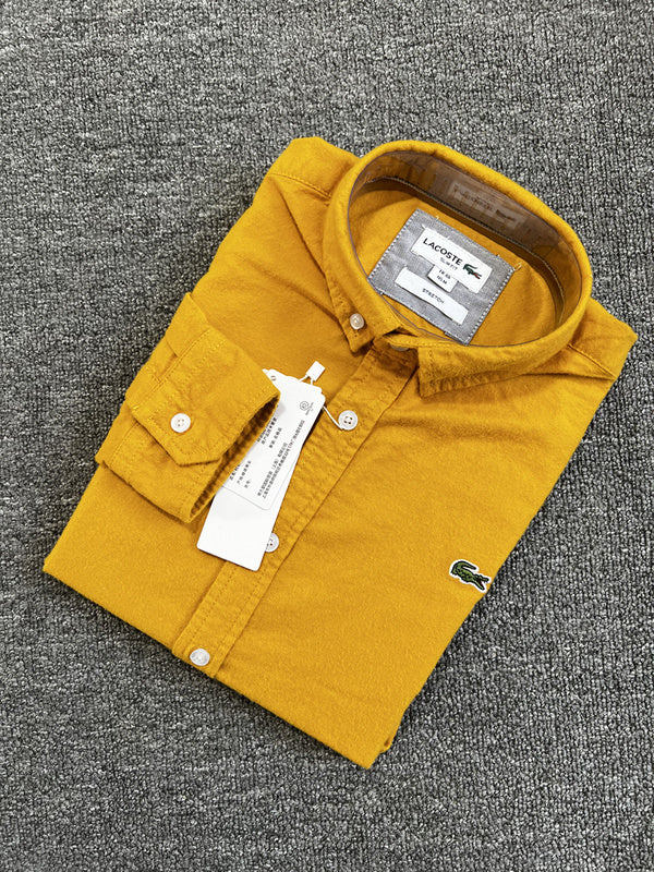 Side profile of Lacoste luxury clothing with logo-detail design