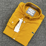Side profile of Lacoste luxury clothing with logo-detail design