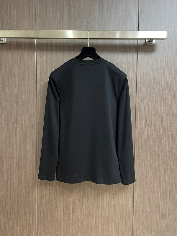 Side profile of Louis Vuitton luxury clothing with tailored silhouette