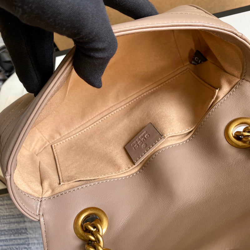 Side profile of elevated chic women's handbag – women's luxury accessory