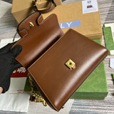 Side profile of signature sleek women's handbag – women's statement bag