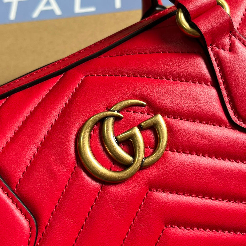 Back view of modern signature women's handbag – women's luxury accessory