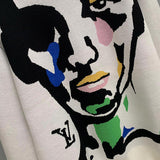 Close-up detail shot of Louis Vuitton luxury clothing with logo-detail design