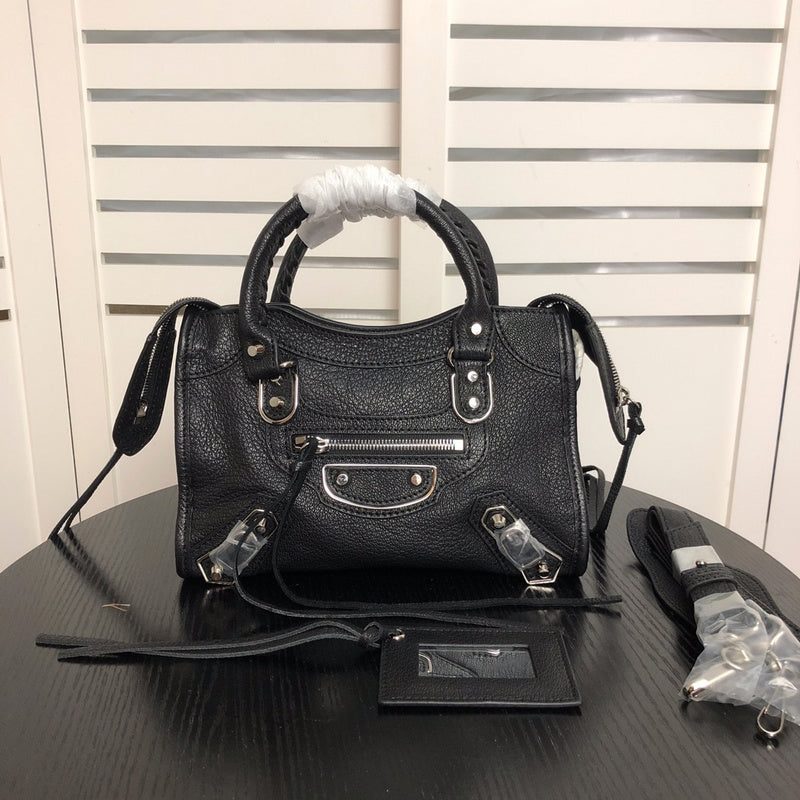 Front view of elevated polished women's handbag – women's luxury accessory