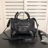 Front view of elevated polished women's handbag – women's luxury accessory