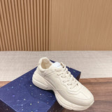 Side profile of Gucci tonal black sneakers bold athletic profile