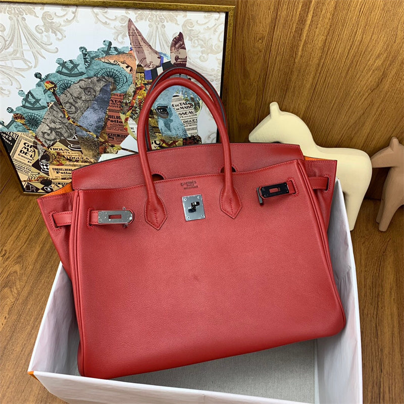  Sleek crossbody bag carried on shoulder