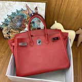  Sleek crossbody bag carried on shoulder