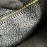 Side profile of modern premium women's handbag – women's designer-style accessory