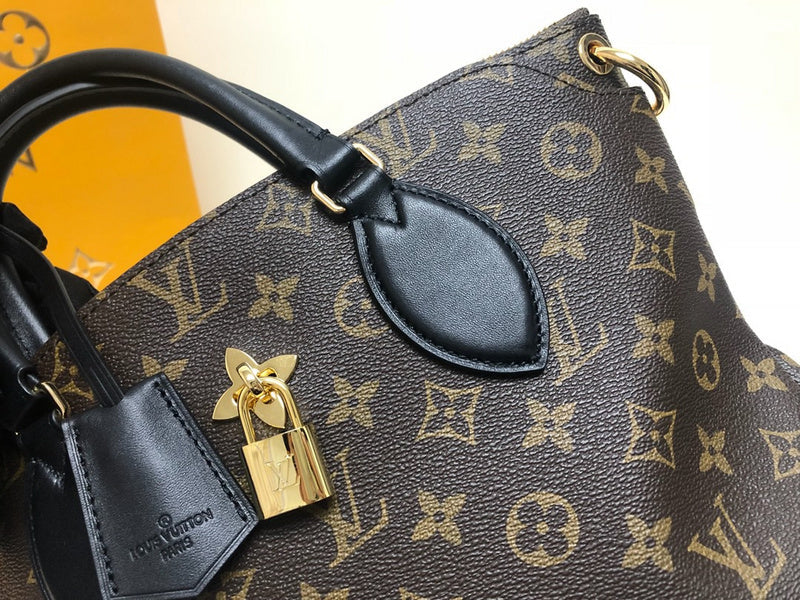 Handle and strap detail of premium chic women's handbag – women's luxury handbag