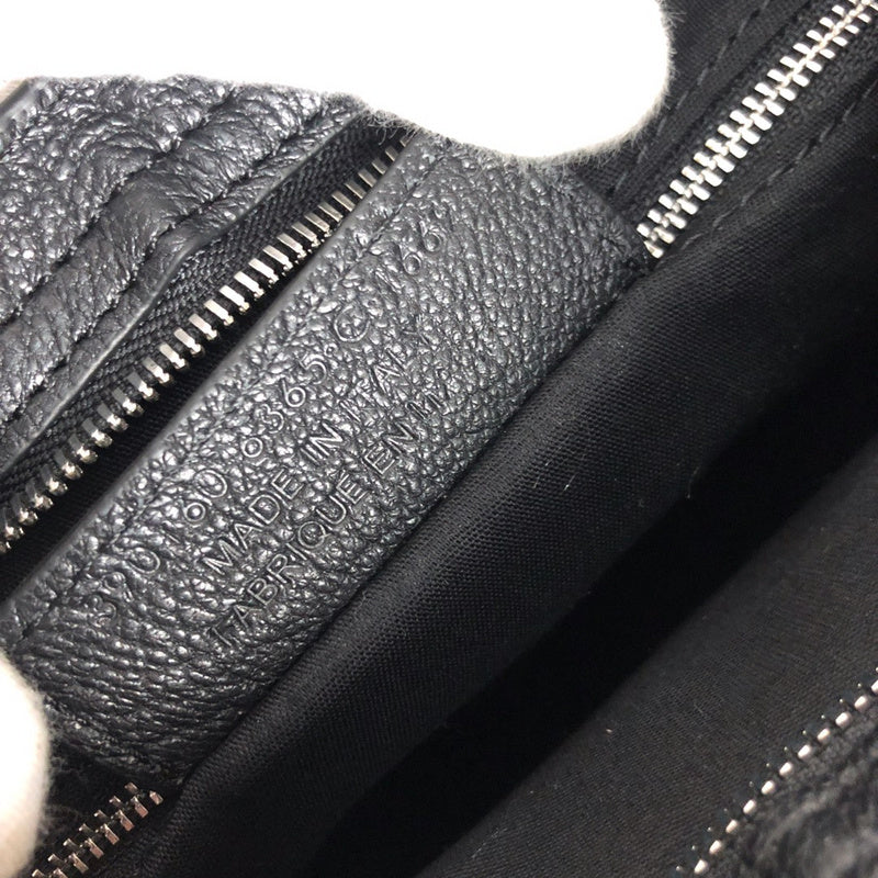 Side profile of elevated modern women's handbag – women's statement bag