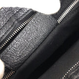 Side profile of elevated modern women's handbag – women's statement bag