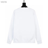 Back view of Louis Vuitton luxury clothing with label-forward styling