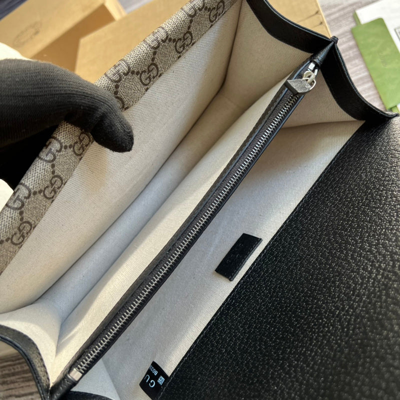 Interior view of chic modern women's handbag – women's statement bag