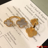 Lifestyle view of Van Cleef & Arpels unisex jewelry piece