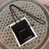 Front view of elevated signature women's handbag – women's luxury handbag