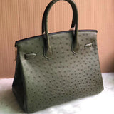 Side view of clean-lined structured handbag