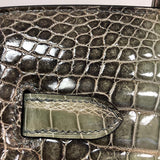 Side view of classic structured handbag